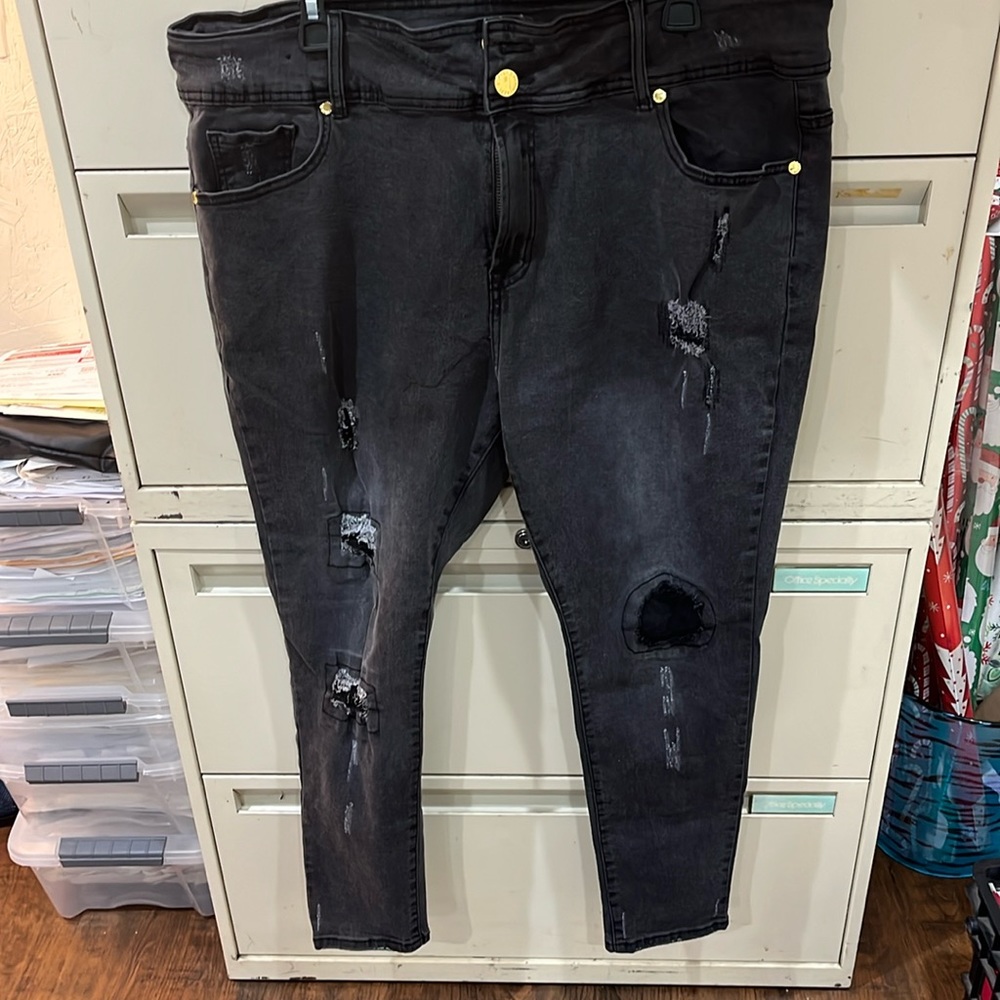 Black denim deconstructed skinny jeans
